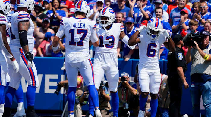 Aug 20, 2022; Orchard Park, New York, USA; Buffalo Bills quarterback Josh Allen (17) congratulates Buffalo Bills wide receiver Gabriel Davis (13) for catching a touchdown pass during the first half against the Denver Broncos at Highmark Stadium.